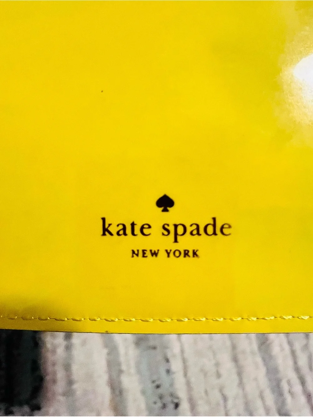 kate spade glossy yellow zip pouch.        NWT